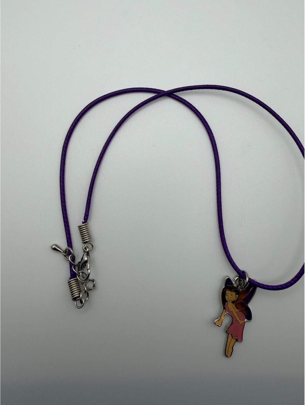 Purple cord fairy charm necklace